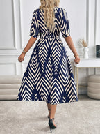 Selina – Geometric Flow Midi Dress