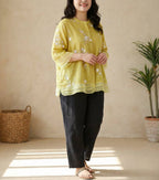 Kourtney | Chic Blouse with Floral Accents